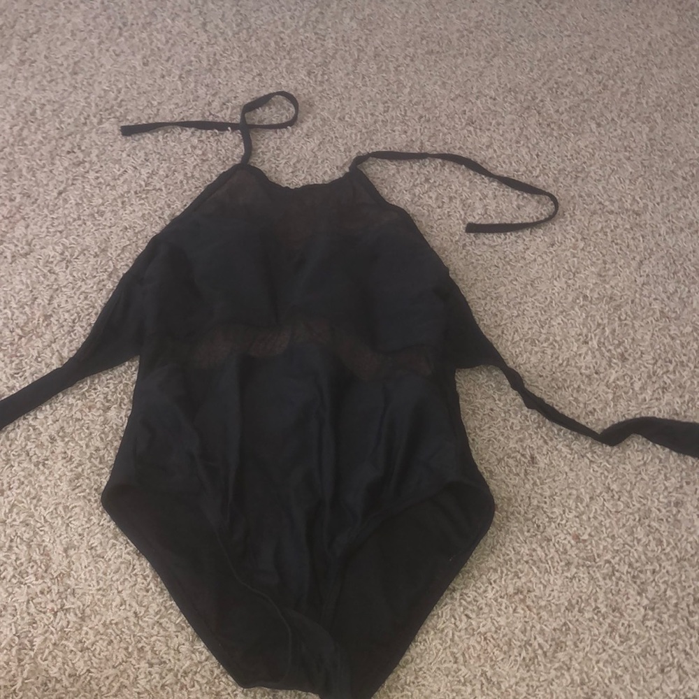 A black 1 piece swimming suit